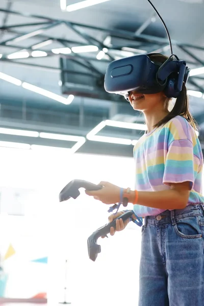 girl-in-vr-glasses-holds-joysticks-in-her-hands-2022-01-19-00-17-18-utc